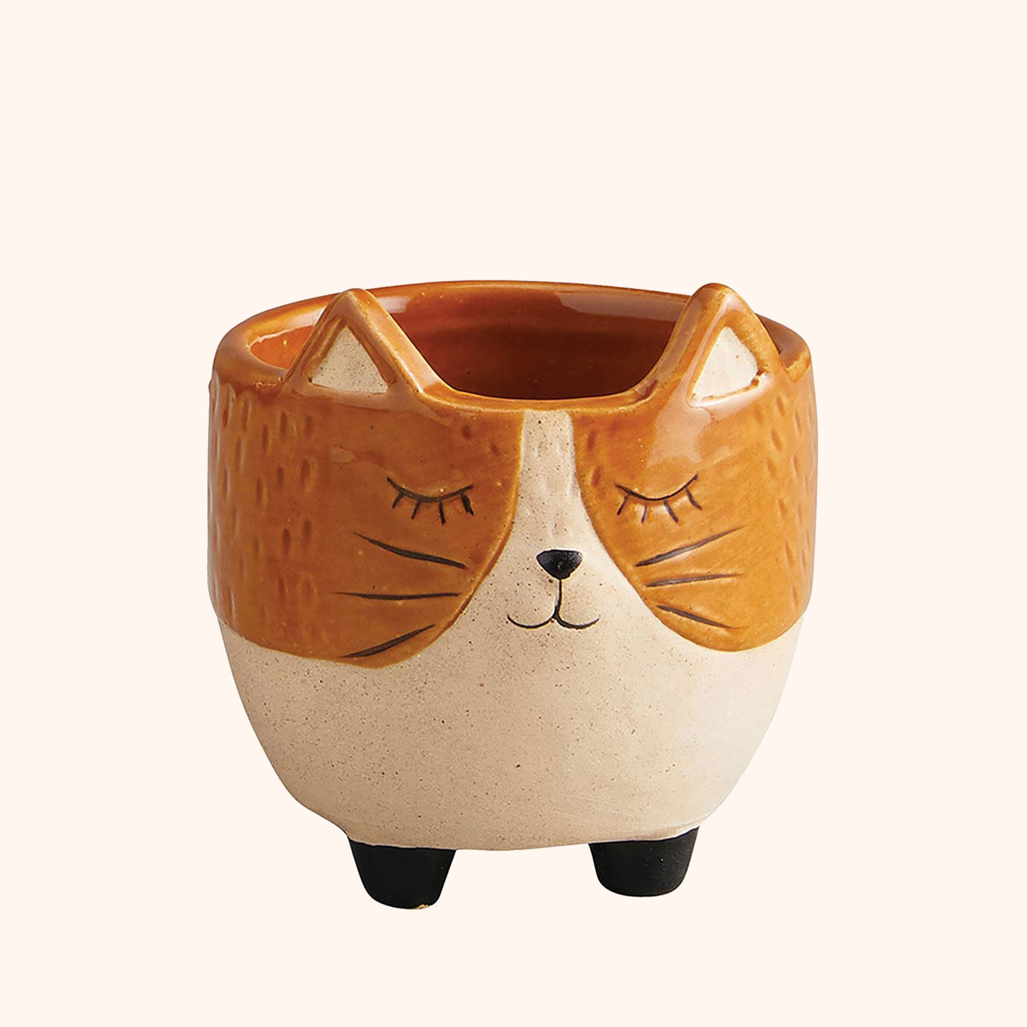 http://www.shoppigment.com/cdn/shop/files/cat-planter-brown.jpg?v=1695075337