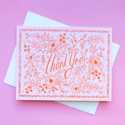 On a purple background is a pink and red thank you card with roses and floral illustrations around text that reads, "Thank You".