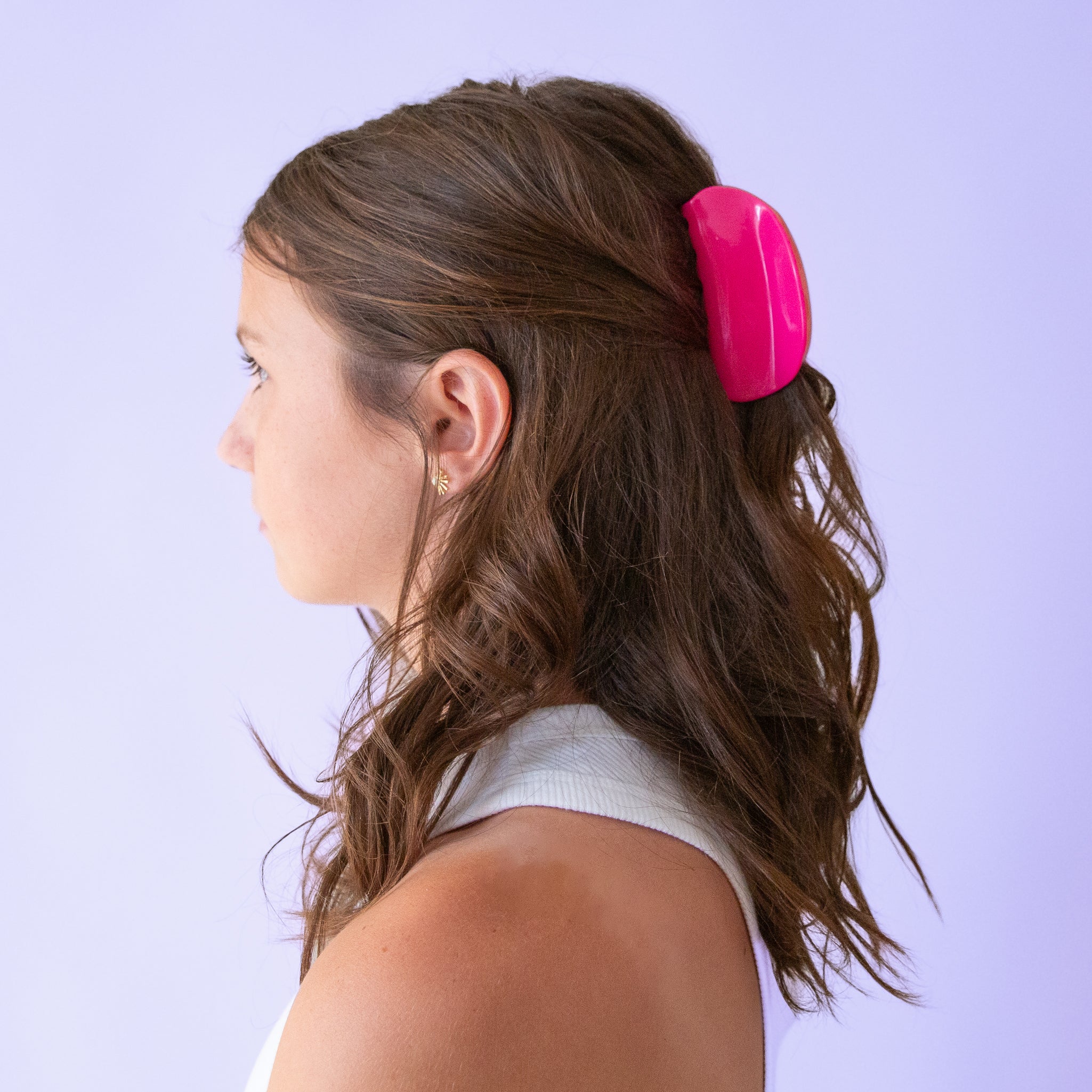 A two-toned, pink and light pink claw clip with rounded edges.