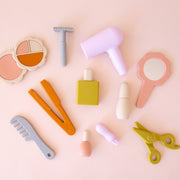 A beauty hair and makeup play set that is all food grade silicone. 