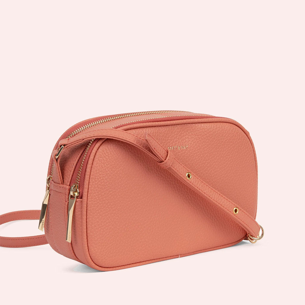 coral colored crossbody bag