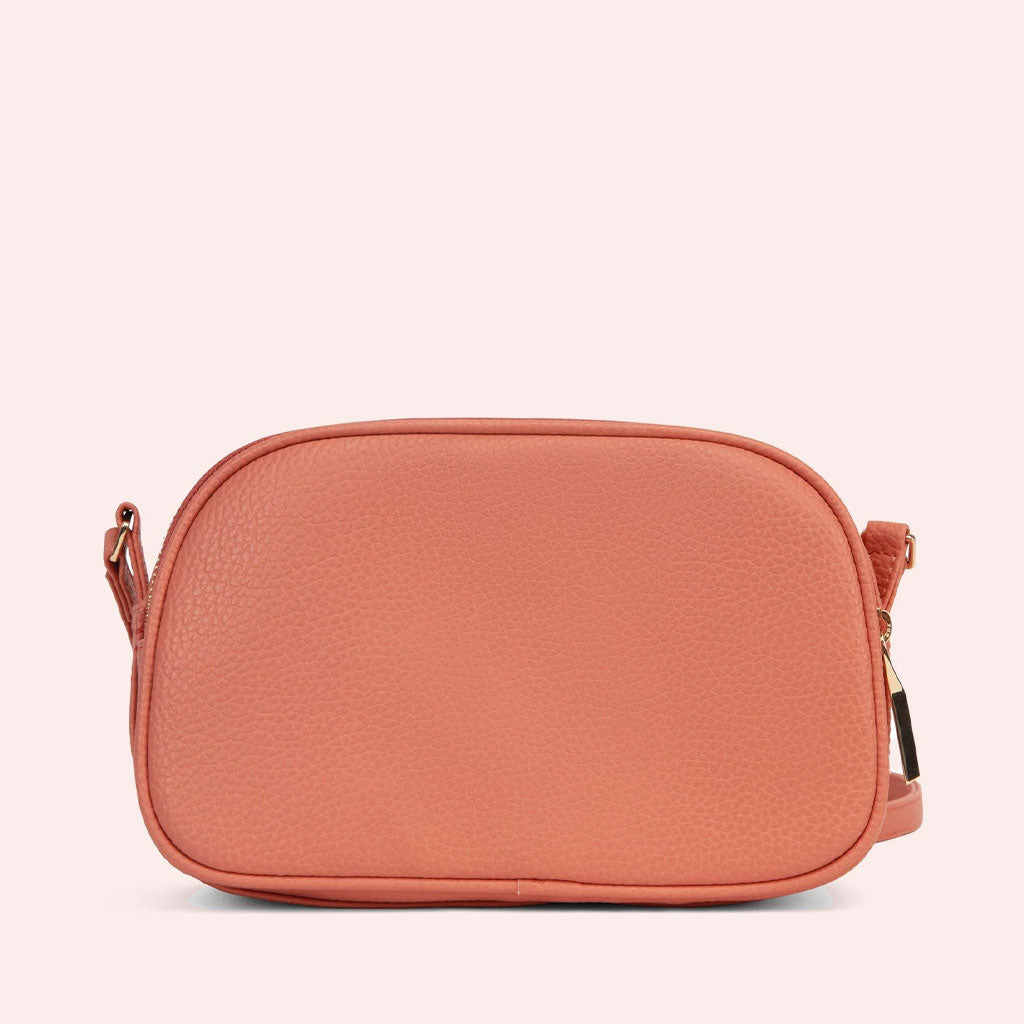 coral colored crossbody bag