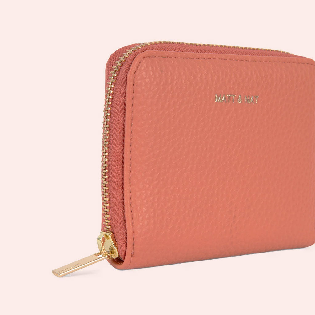 small zip around wallet in coral color