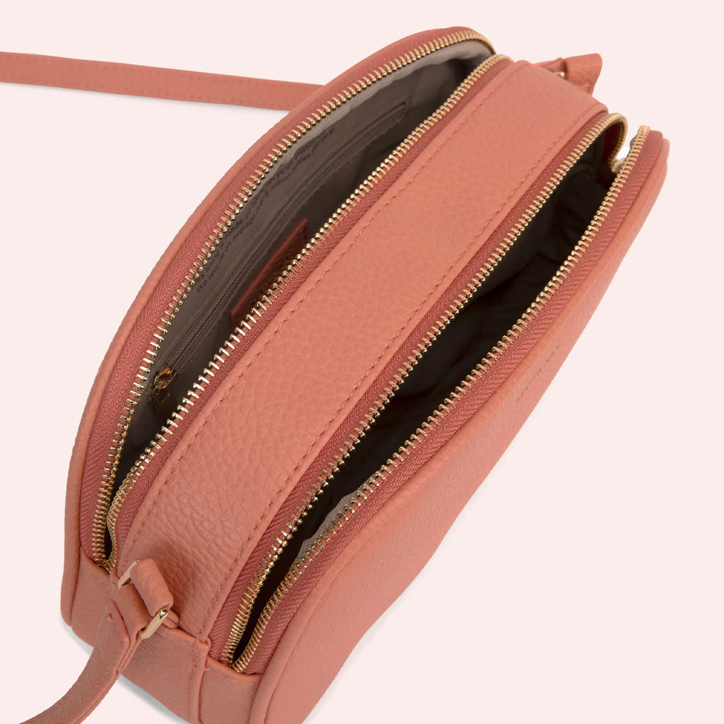 coral colored crossbody bag