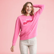 A hot pink crewneck sweatshirt with hot pink and light pink "Ho Ho Ho" across the front.