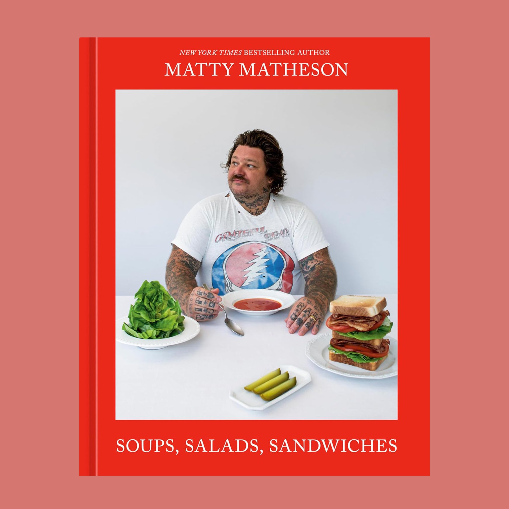 A red book cover with Matty Matheson on the front and text that reads, 'Soups Salads Sandwiches'.