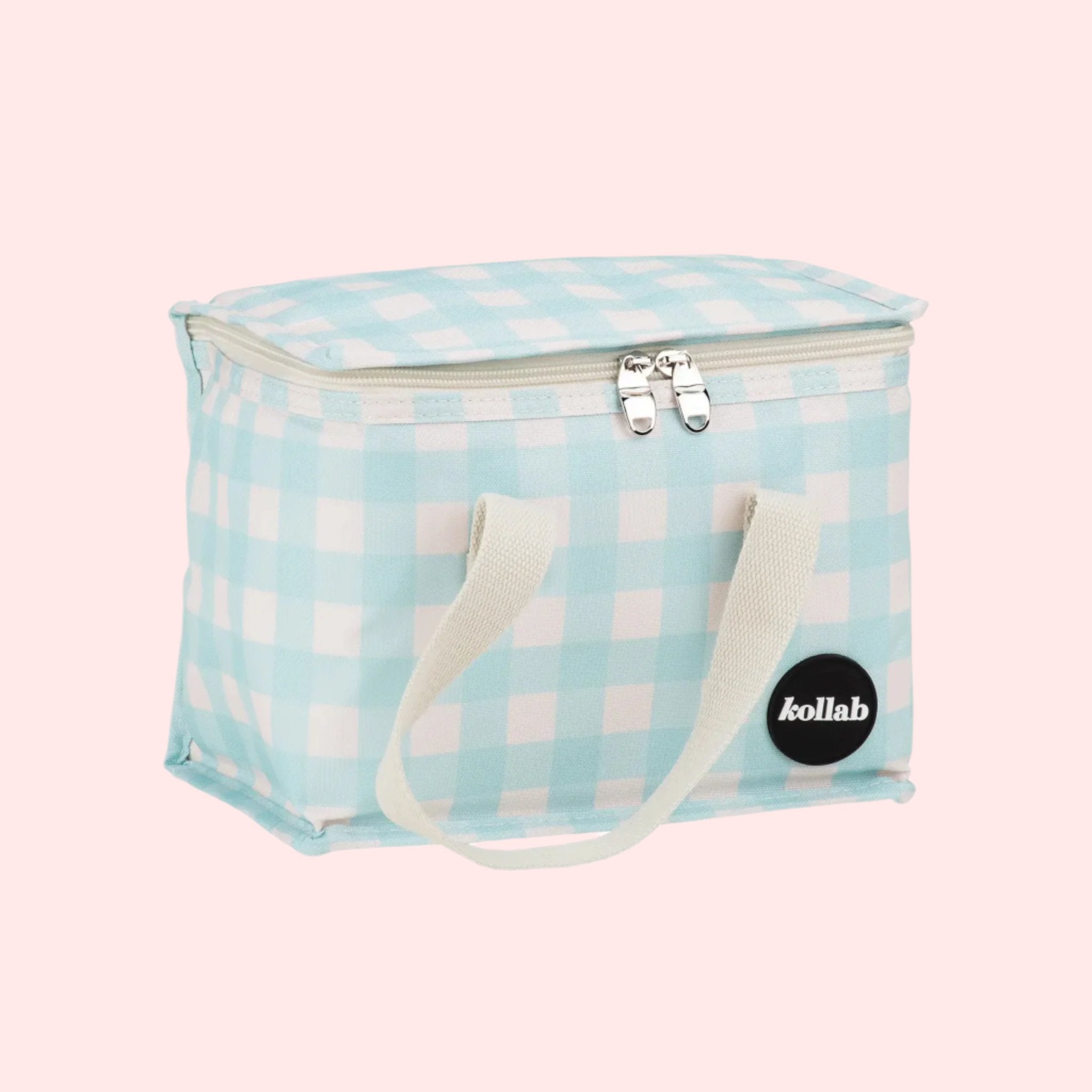 A light blue and white checkered print lunch box with ivory canvas handles. 