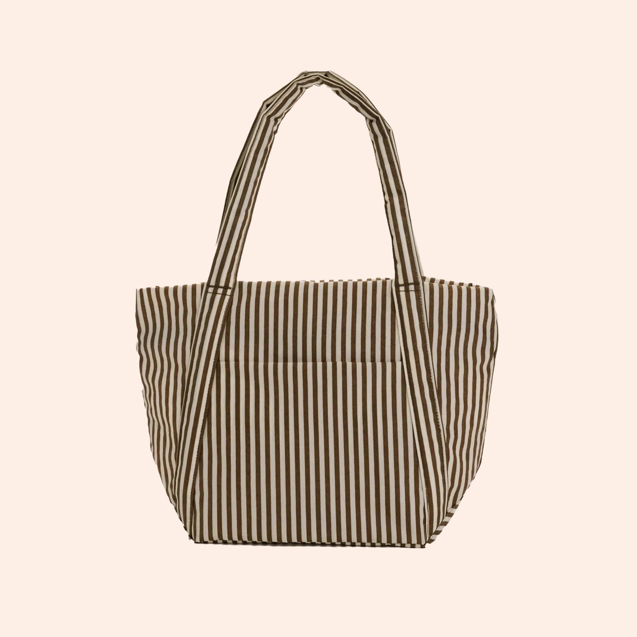 A brown and white stripe nylon tote bag with shoulder handles and a front pocket. 