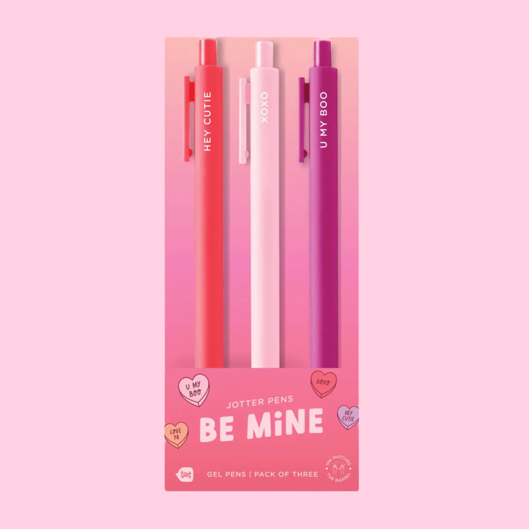 A pack of three gel ink pens in a red, pink and hot pink shade with white text on each that reads either, 'hey cutie', 'xoxo', or 'u my boo'. 