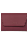 On a white background is a dark cherry red wallet. 