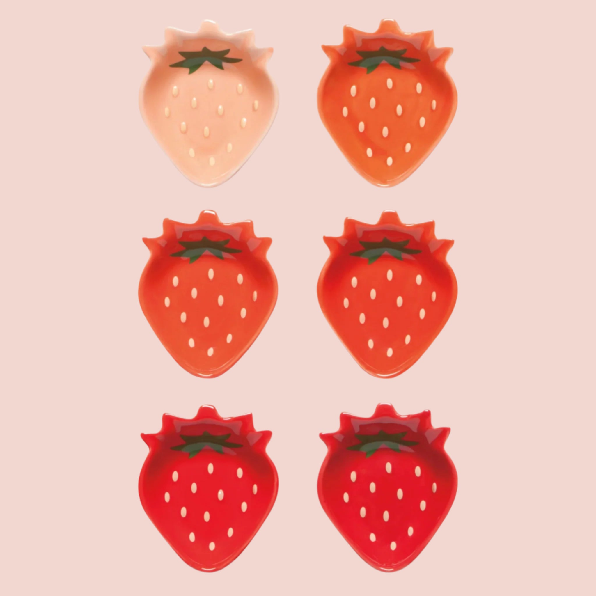 A set of size strawberry shaped mini bowls. 