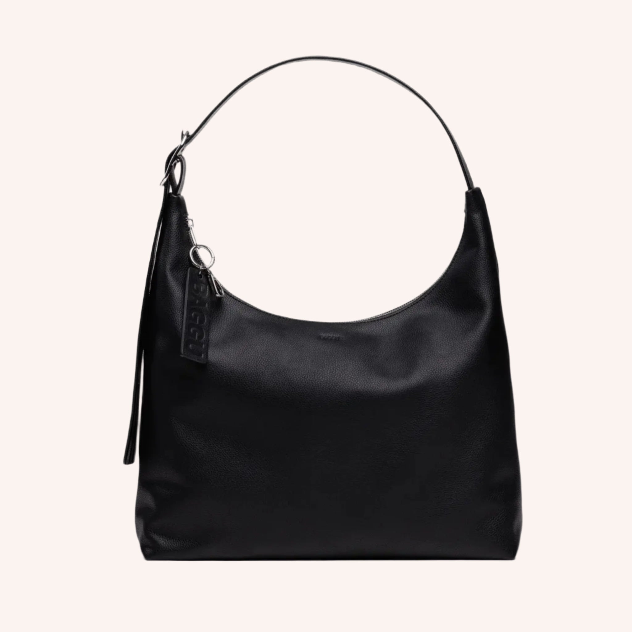 A black leather handbag with an adjustable strap. 