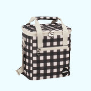 A black and white mini cooler bag with zipper closures and straps. 