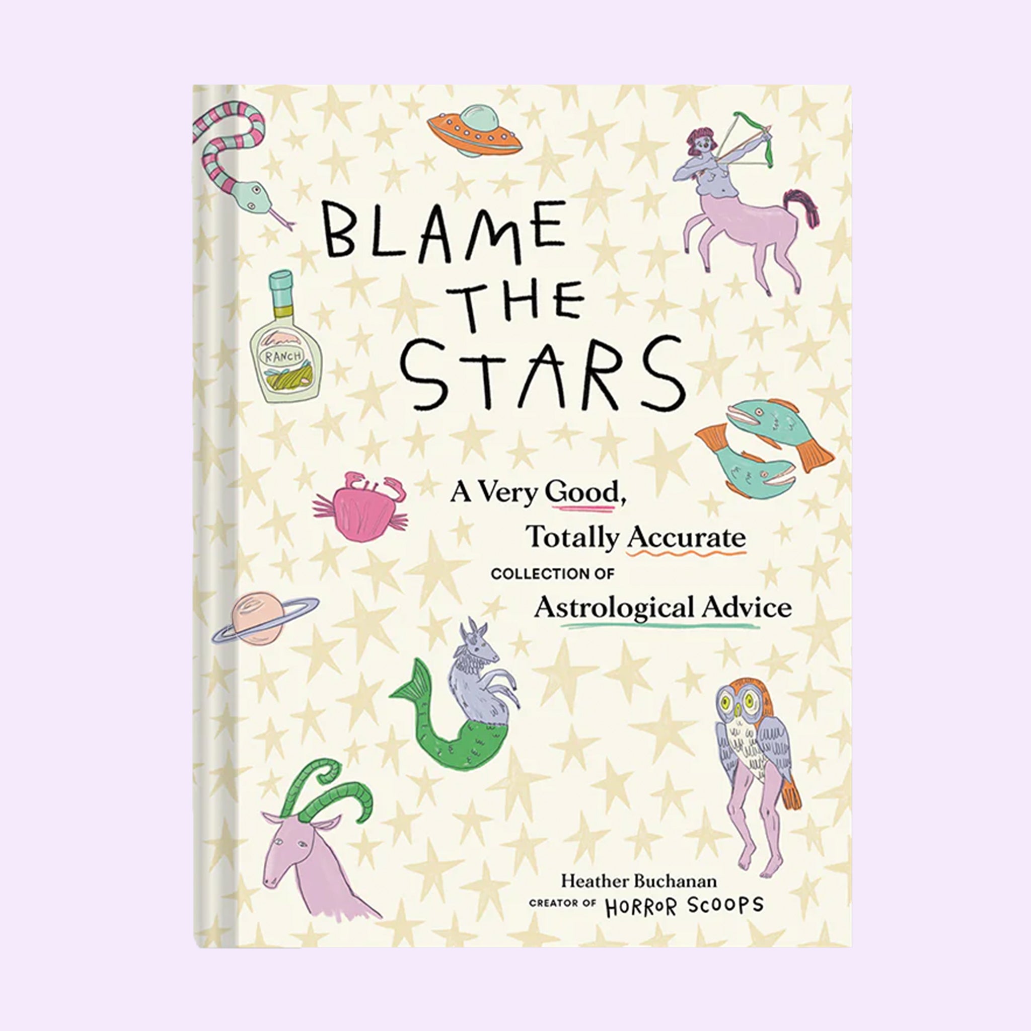 On a lavender background is an ivory and tan star book cover with astrology themed graphics and the title that reads, &quot;Blame The Stars A Very Good, Totally Accurate Collection Of Astrological Advice&quot;. 