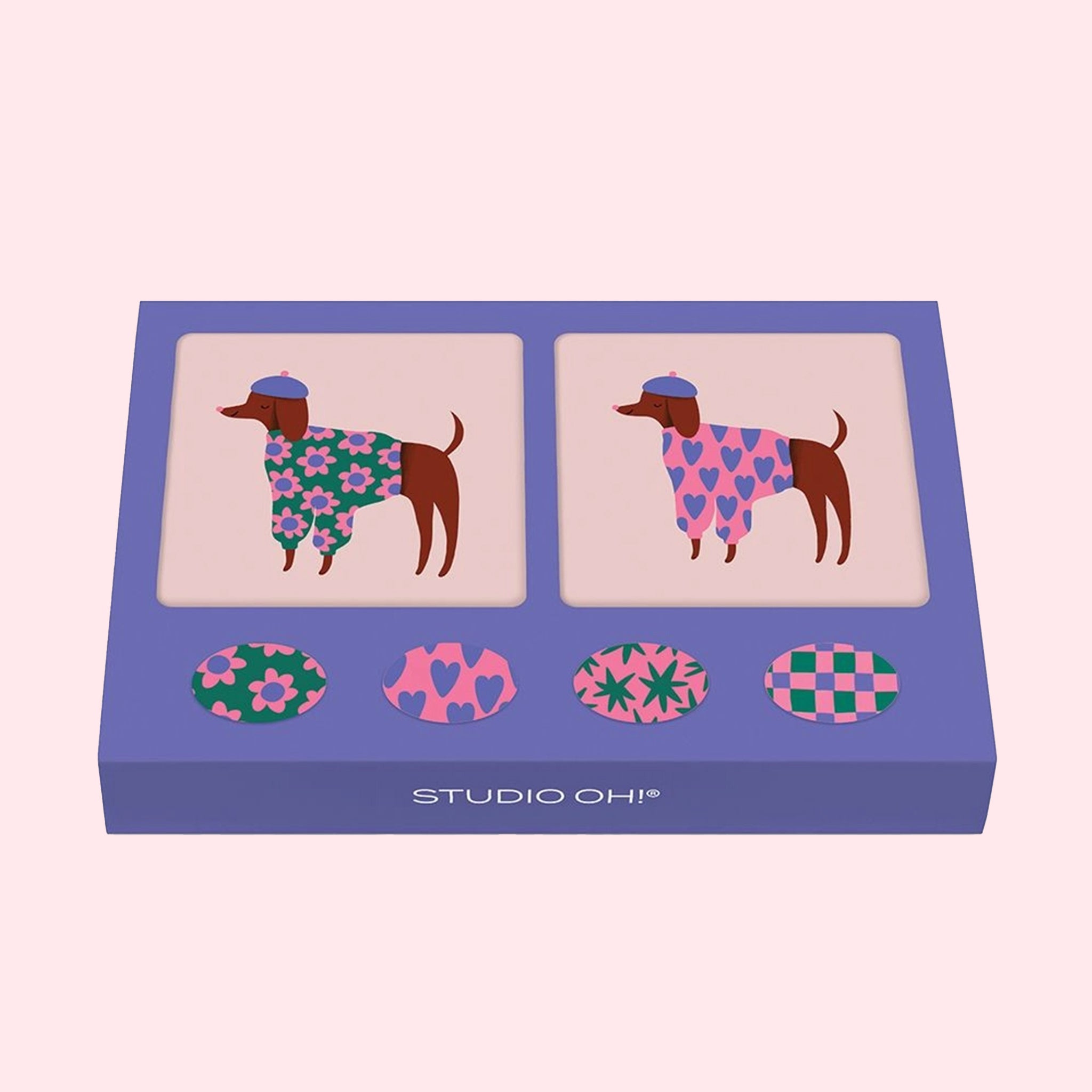 A set of mini note cards with dogs on it in different sweaters and berets, envelopes and stickers. 