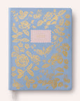 front cover of a bookbound planner, light blue with gold flowers
