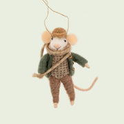 A white mouse shaped ornament wearing a cozy winter outfit and a crossbody bookbag. 