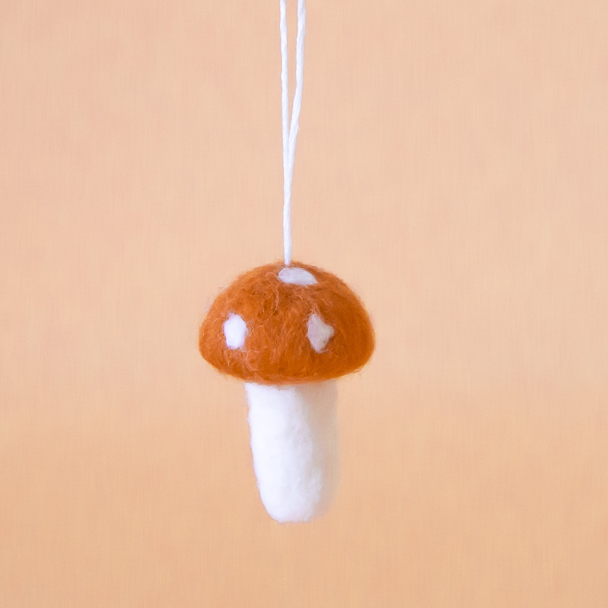 {&quot;media&quot;:[{&quot;id&quot;:&quot;gid://shopify/MediaImage/24231669071923&quot;,&quot;alt&quot;:&quot;Brown felt mushroom ornament with white spots on the mushroom cap, and a white stem are shown against a peach colored background. &quot;,&quot;type&quot;:&quot;IMAGE&quot;,&quot;src&quot;:&quot;https://cdn.shopify.com/s/files/1/0350/5665/files/felt-mushroom-brown_24x24@3x.jpg?v=1727893242&quot;,&quot;altText&quot;:&quot;Brown felt mushroom ornament with white spots on the mushroom cap, and a white stem are shown against a peach colored background. &quot;}],&quot;mediaCount&quot;:1}