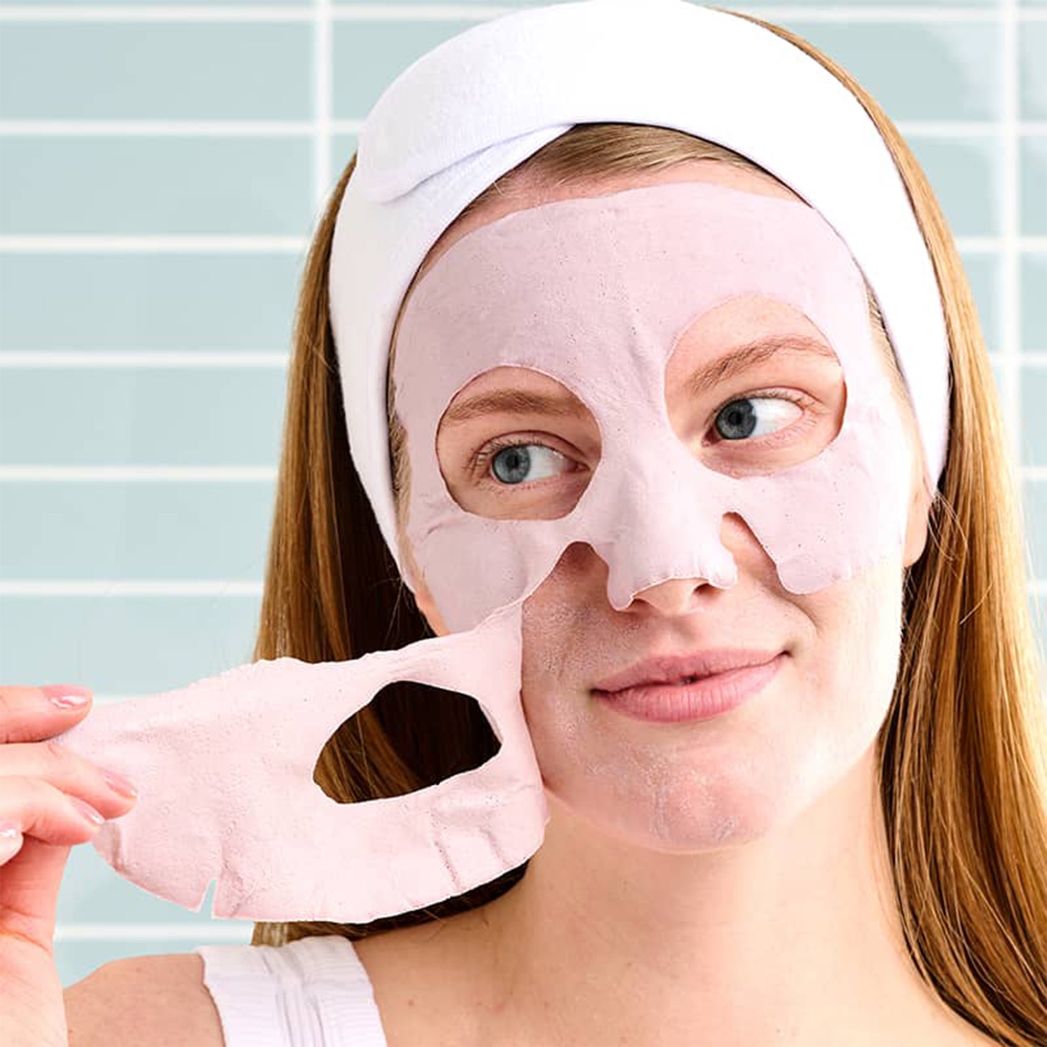 A pink mud mask in a sheet mask form packaged in a two-toned pink packaging.