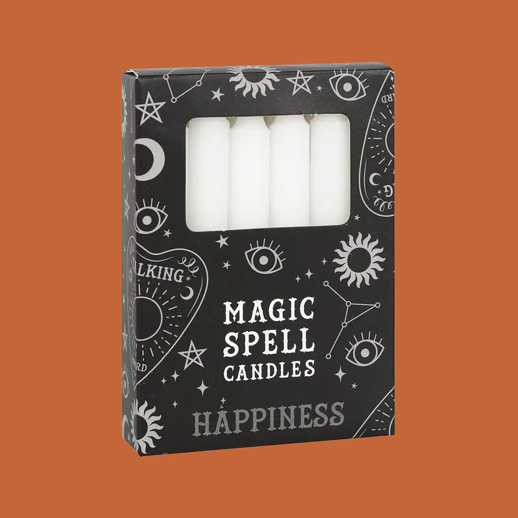 A set of 12 taper candles in a black box with text that reads, &quot;Magic Spell Candles&quot;. 