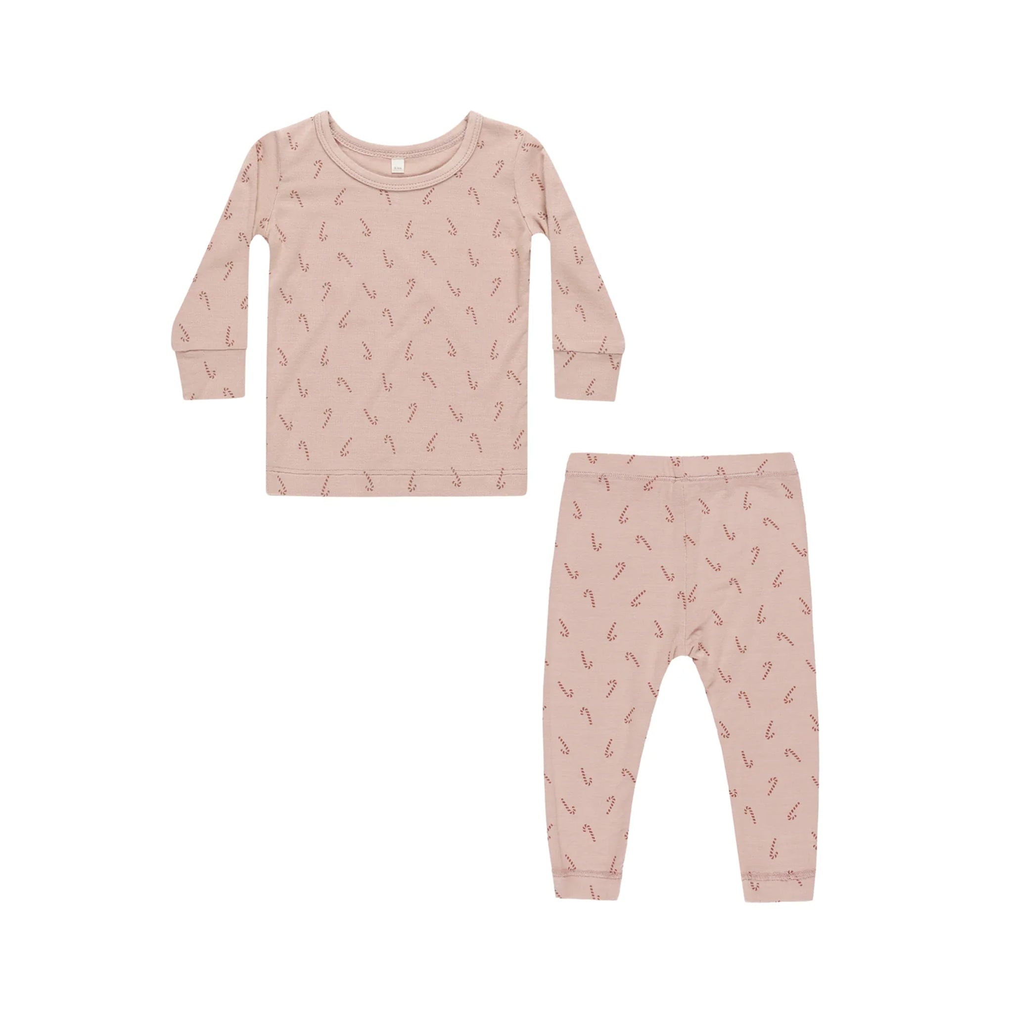 A pink pajama set with a candy cane print. 