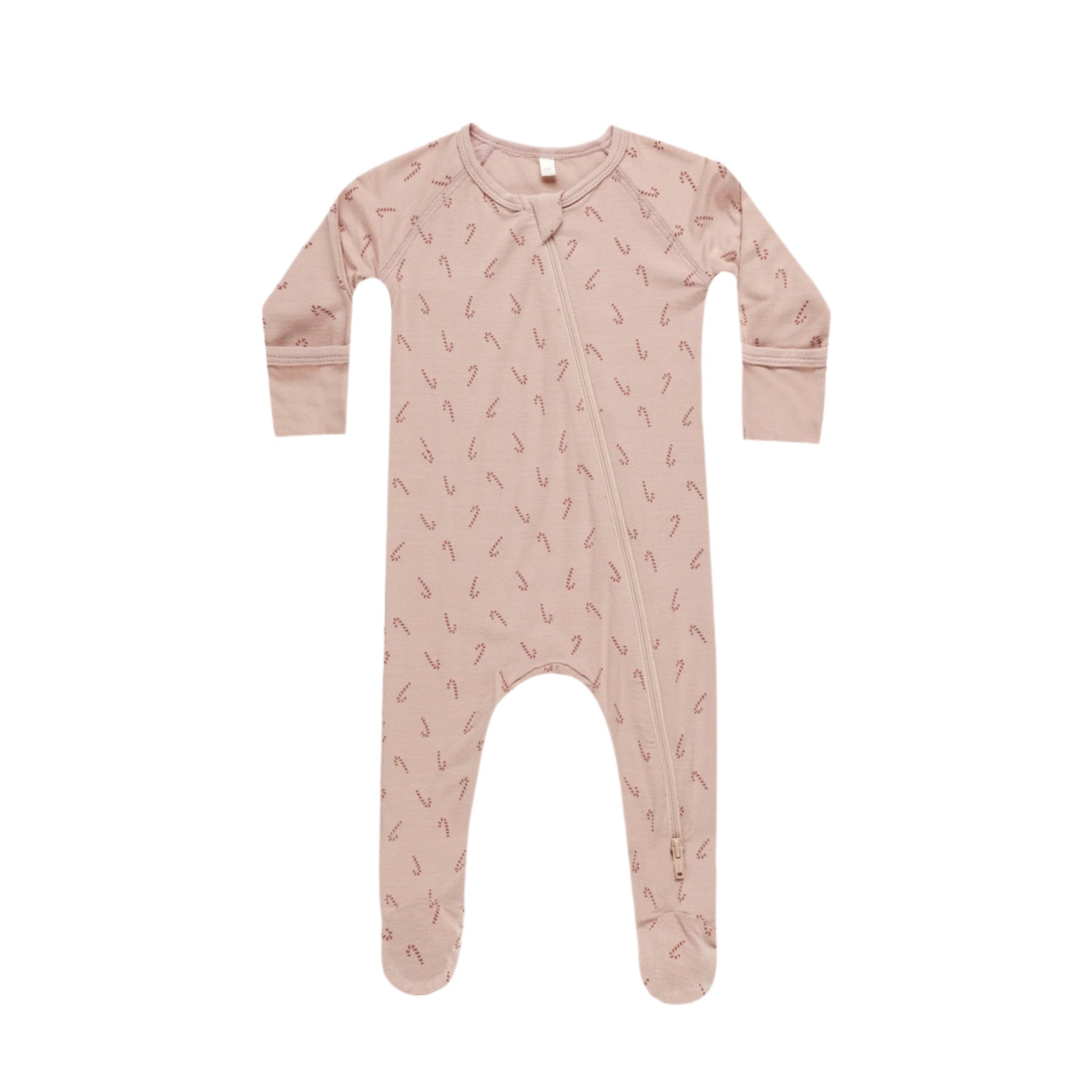 A light pink onesie with a front zipper and a candy cane print. 