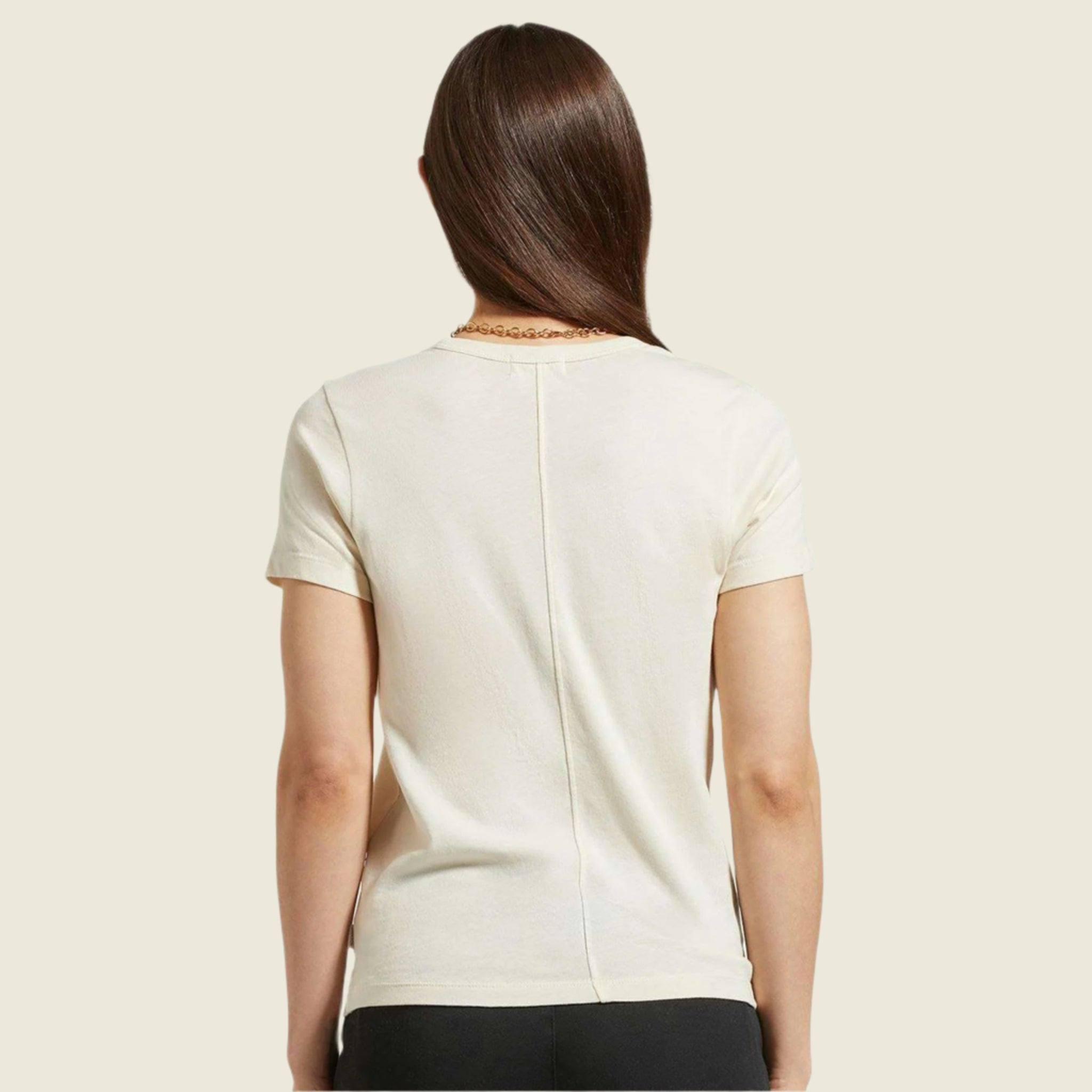 A cream off white t-shirt. 