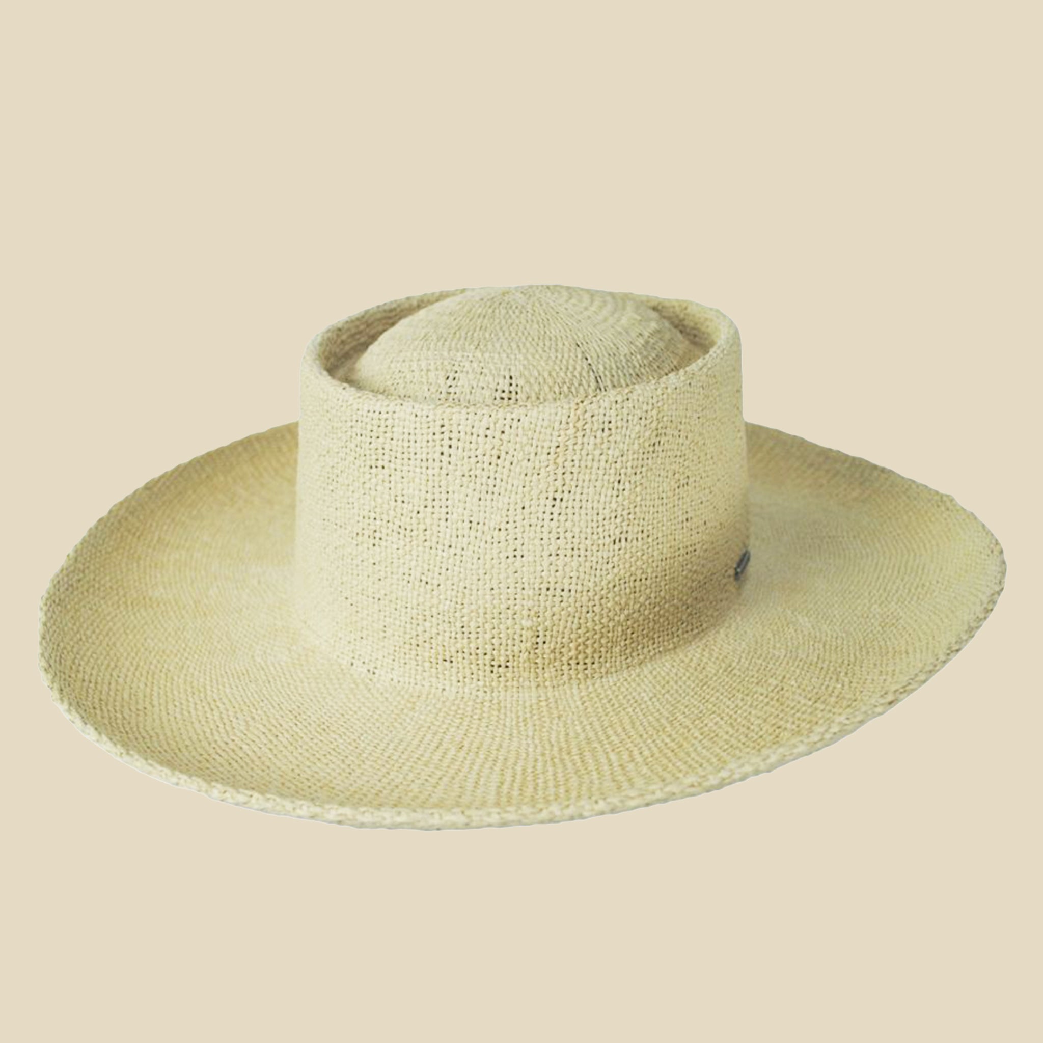 A natural colored straw sun hat with a slightly curved brim. 