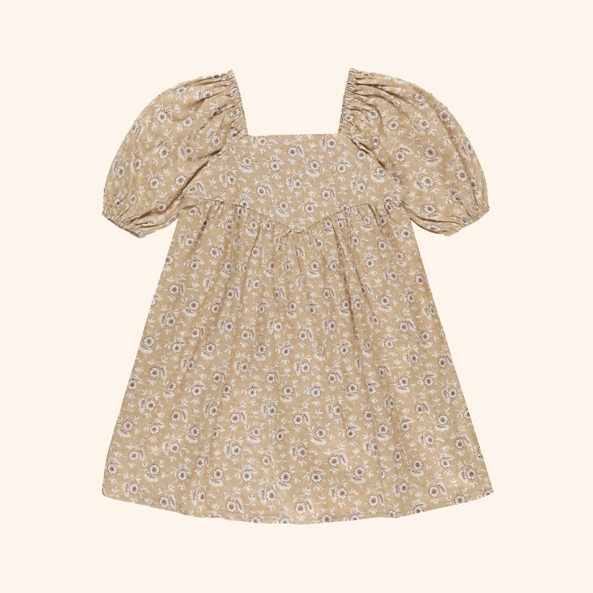 A neutral swing dress with puff sleeves, a square neckline and an all over floral print. 