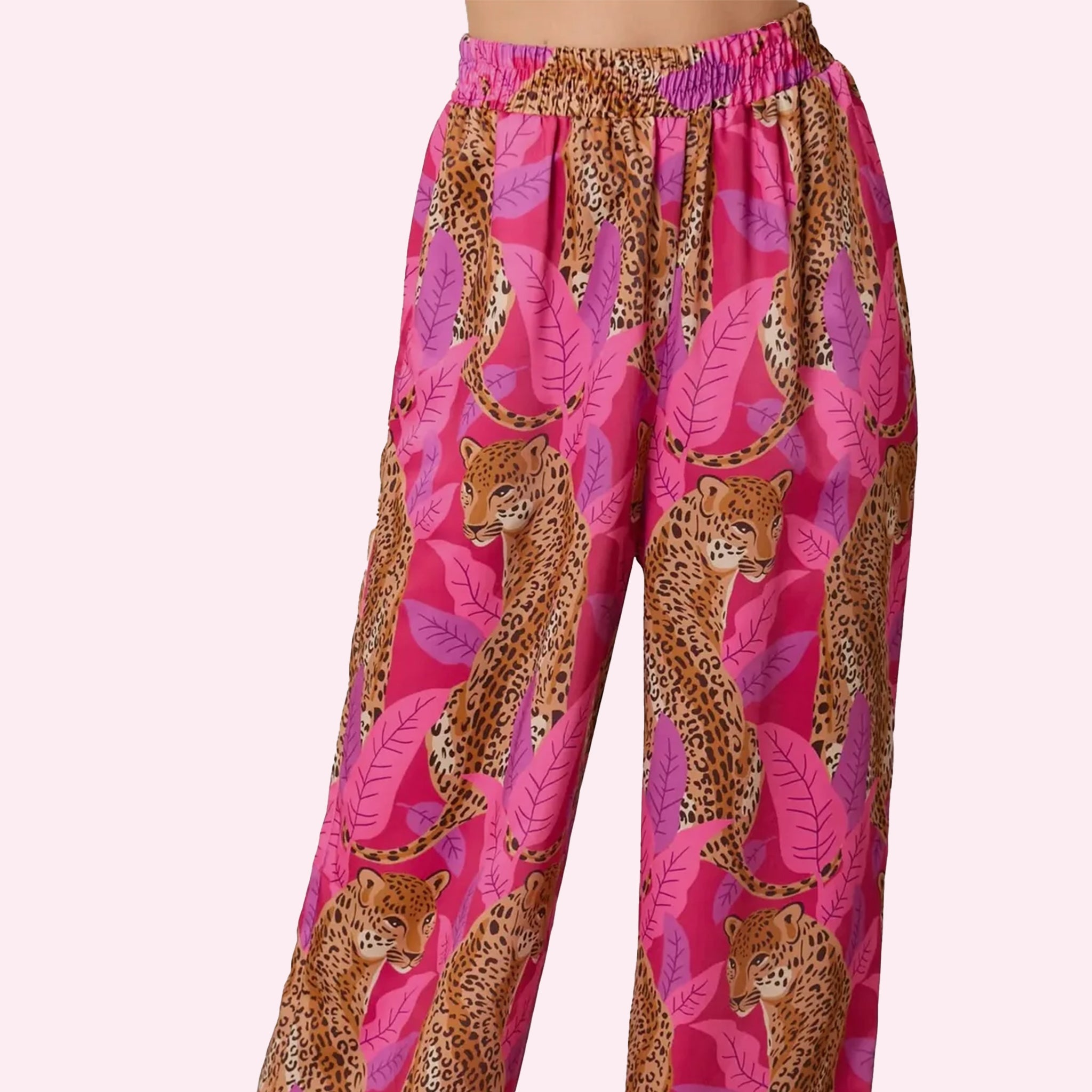 A pink cheetah print satin pajama pant.