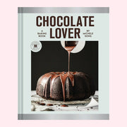 A light blue book cover with a chocolate bunt cake on the front and text above that reads, 'Chocolate Lover A Baking Book'. 