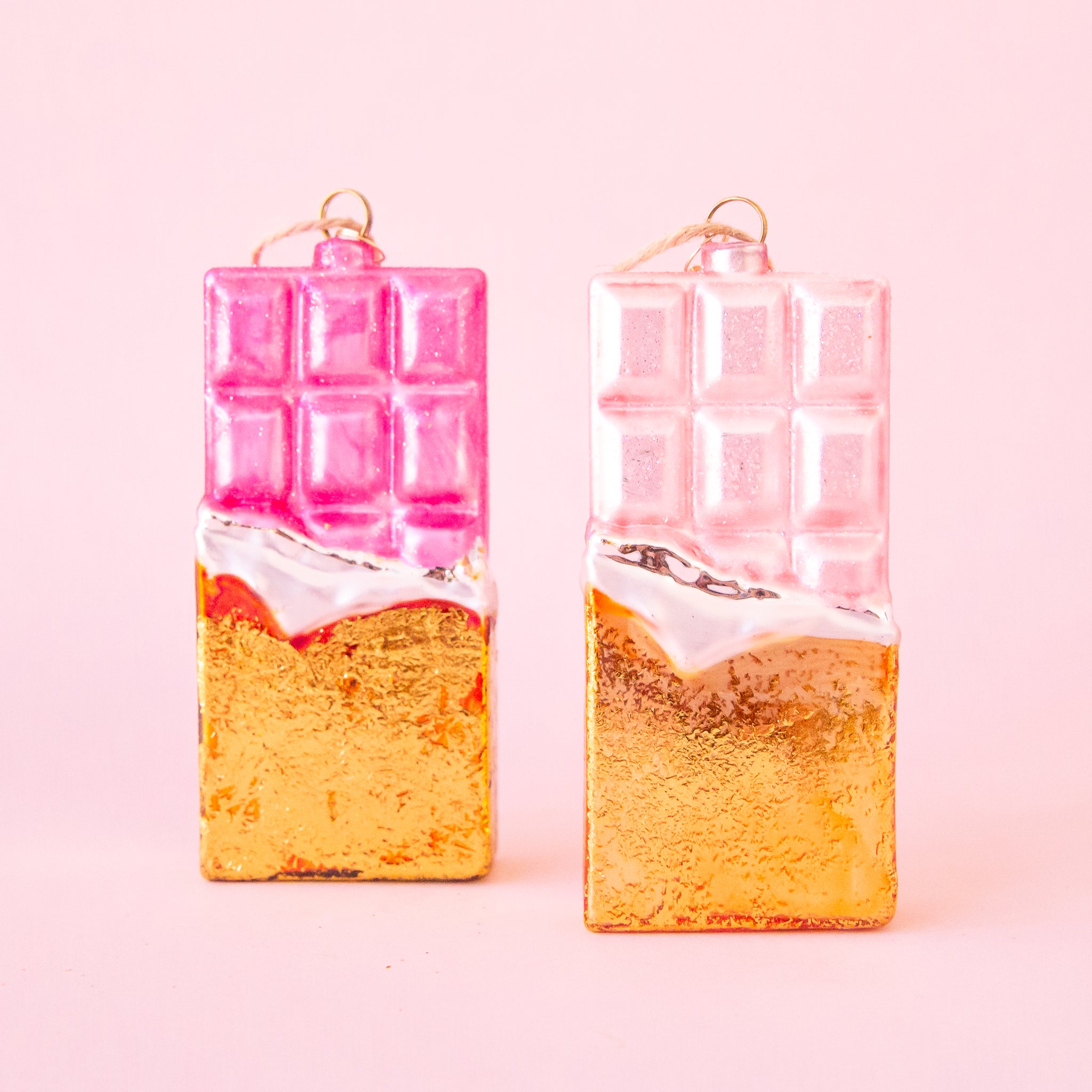 A pink and gold glass shaped chocolate bar with the loop for hanging. 