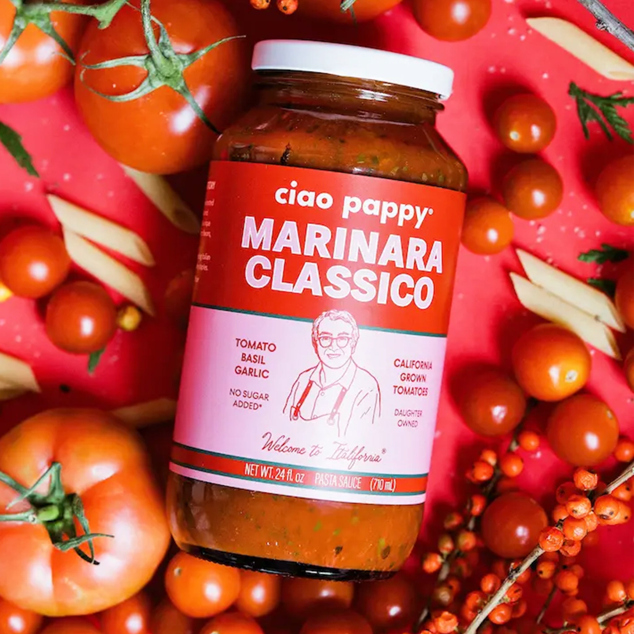 A glass jar of marinara with text that reads, &#39;ciao pappy Marinara Classico&#39;. 