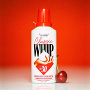 An SPF that looks like a can of whipped cream with a white can that says, "Classic Whip SPF 30" along with a red cap and accents.