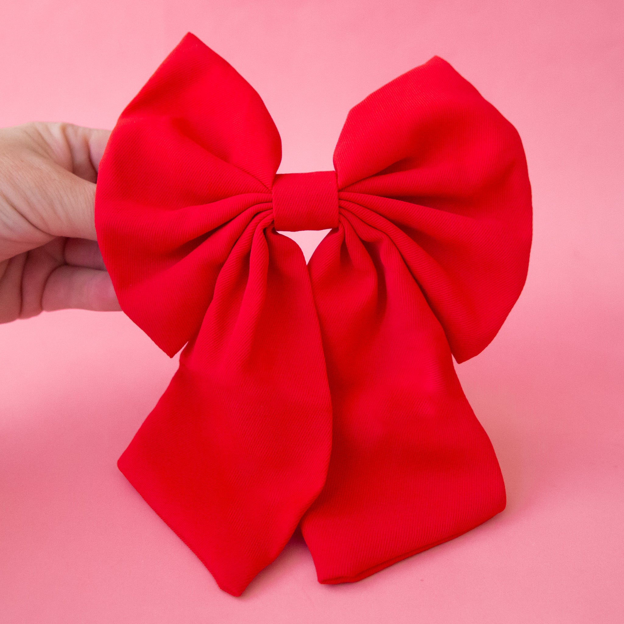 A red oversized bow for hair. 