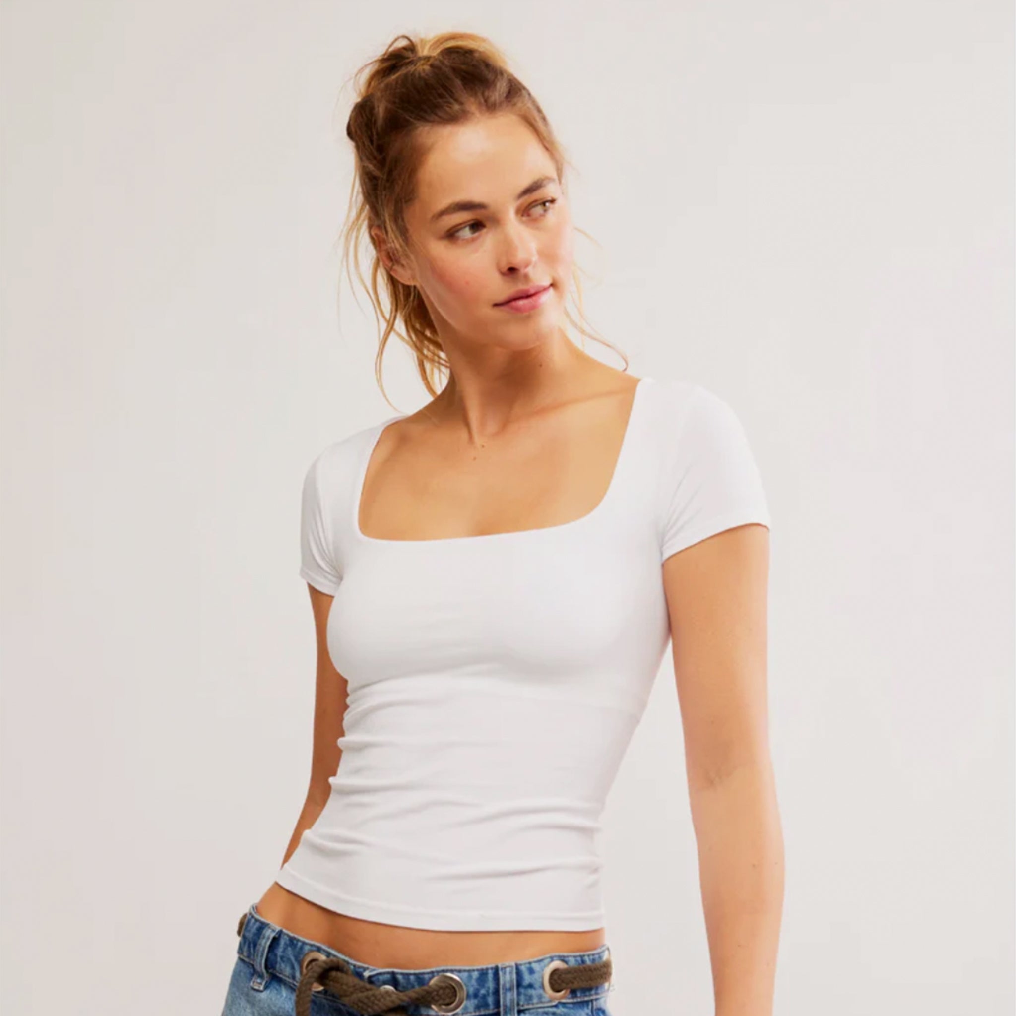 A white short sleeve t-shirt with  square neckline. 