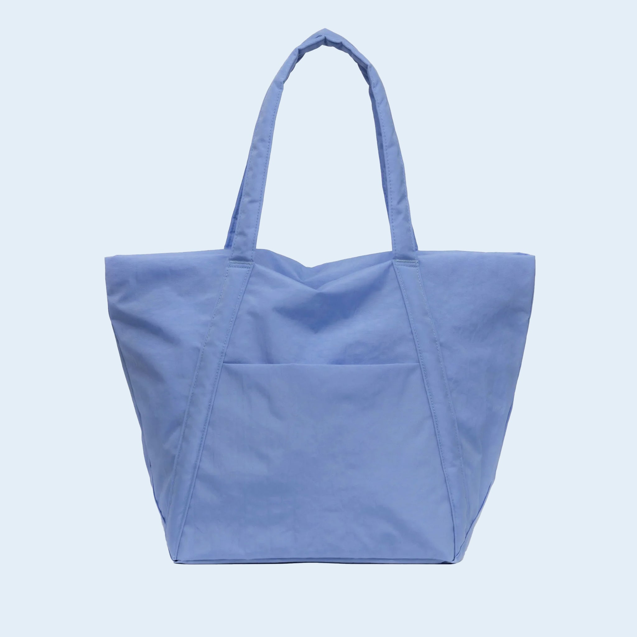 A blue nylon tote bag with two handle straps and a front pocket. 