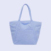 A light blue puffy tote bag. 