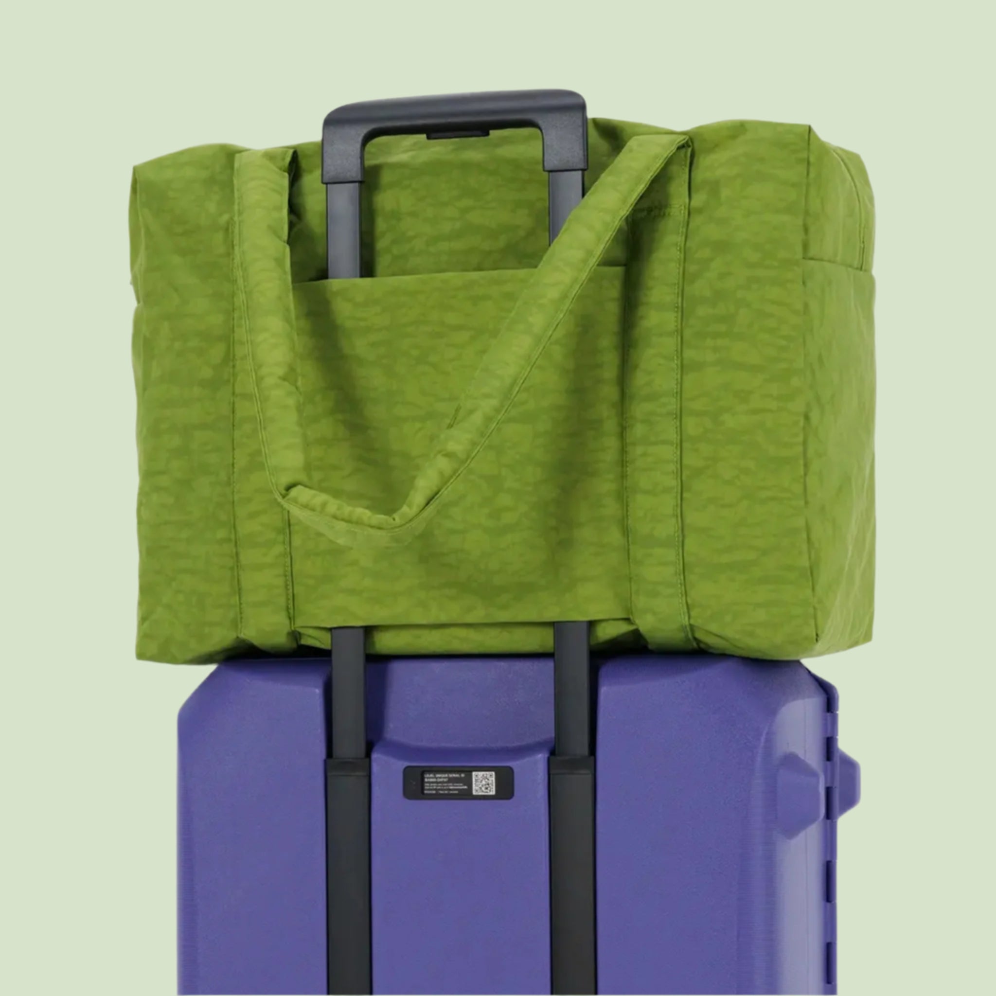 A vibrant green puffer tote bag. 