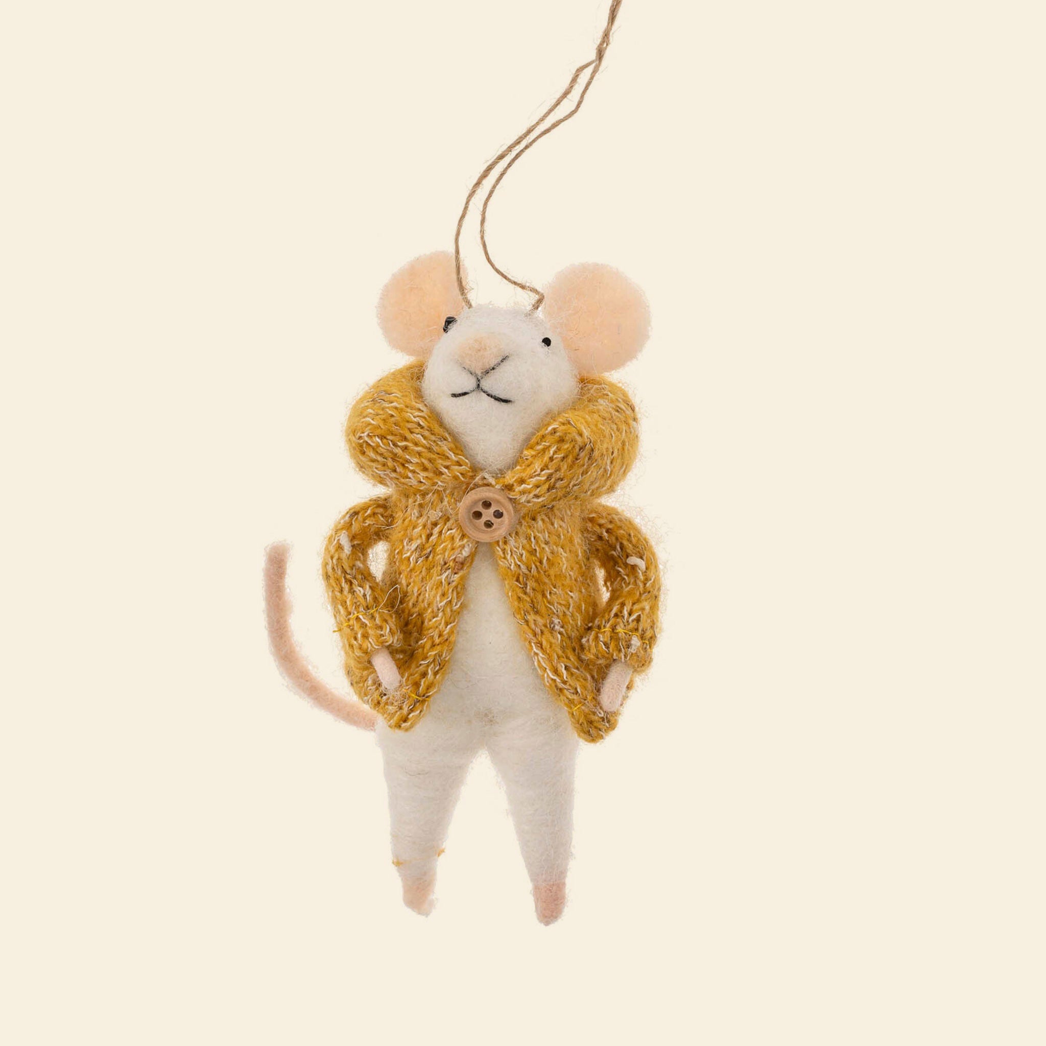 A mouse shaped ornament wearing a yellow sweater. 