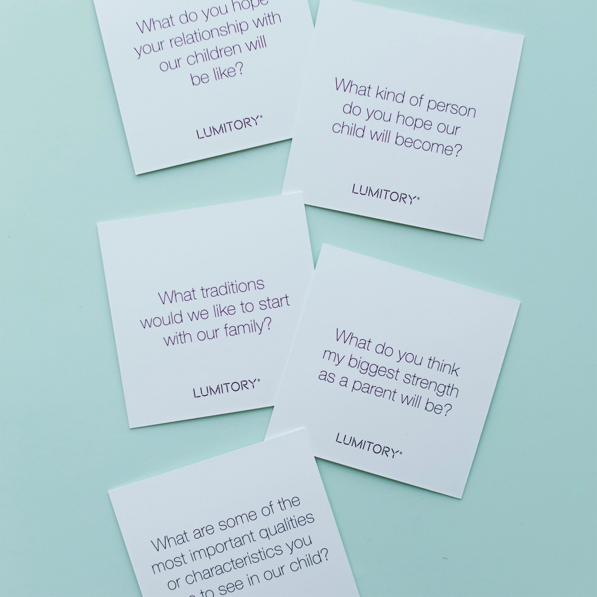 A box of conversation cards geared towards new parents. 