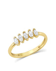 The Cooper Ring is a thin gold band with 5 cz diamonds stacked next to one another across the top.