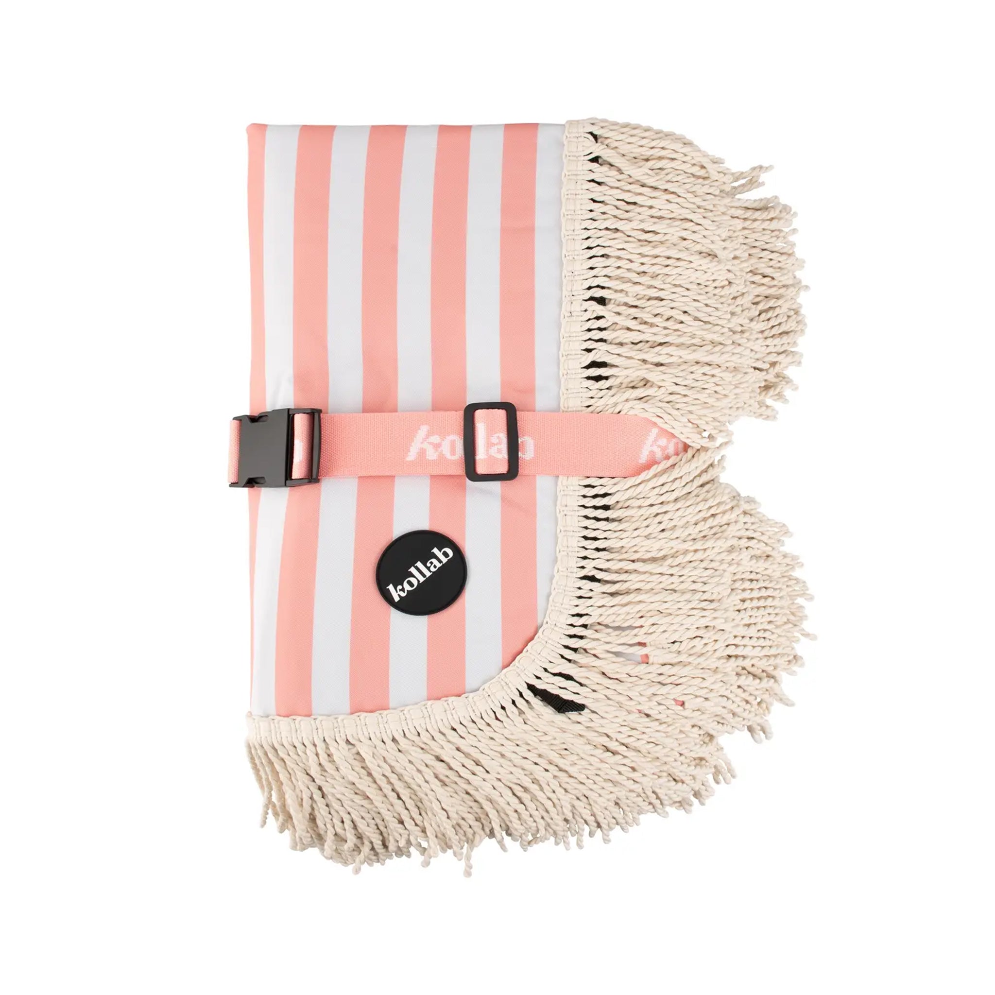 A coral and ivory stripe picnic mat with a fringe edge and a buckle for folding. 