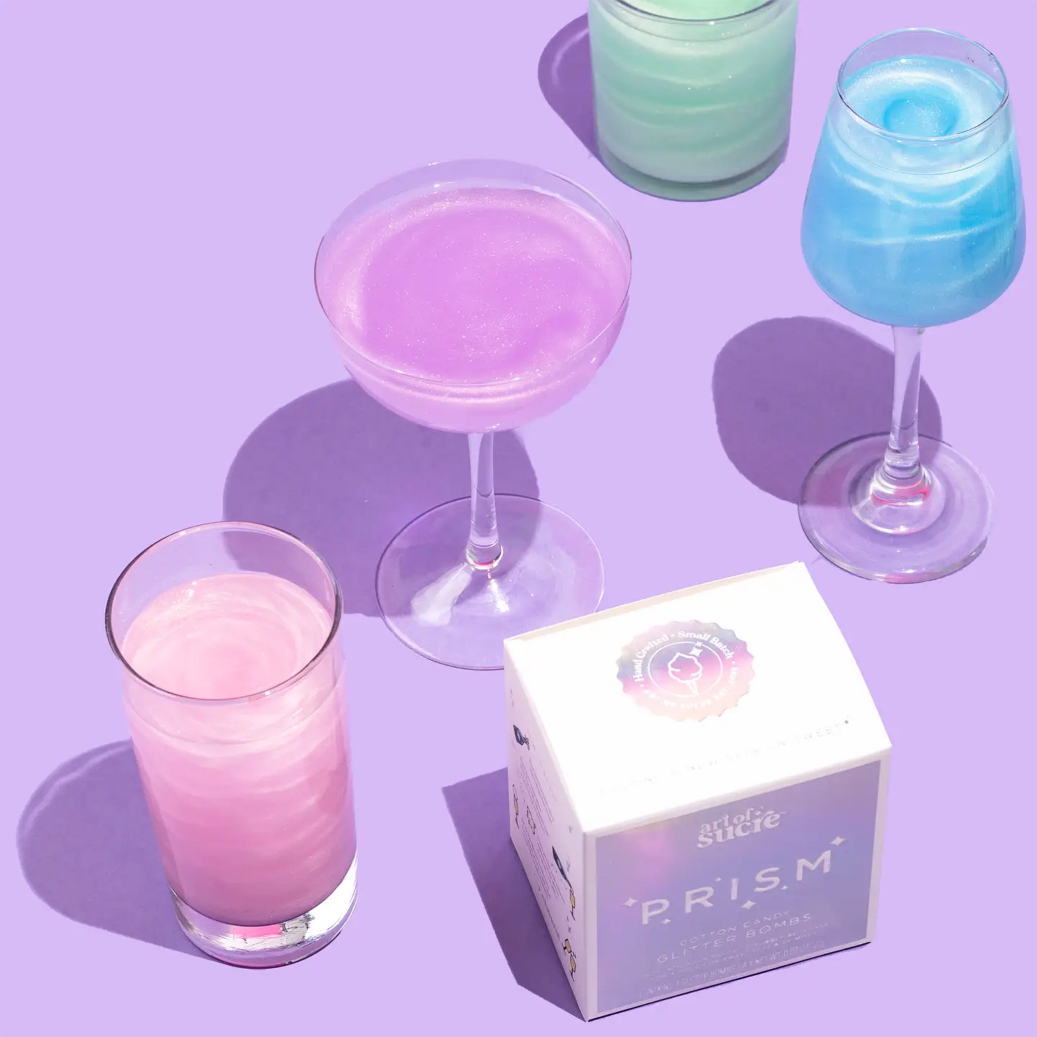 A box of four cotton candy cocktail glitter bombs. 