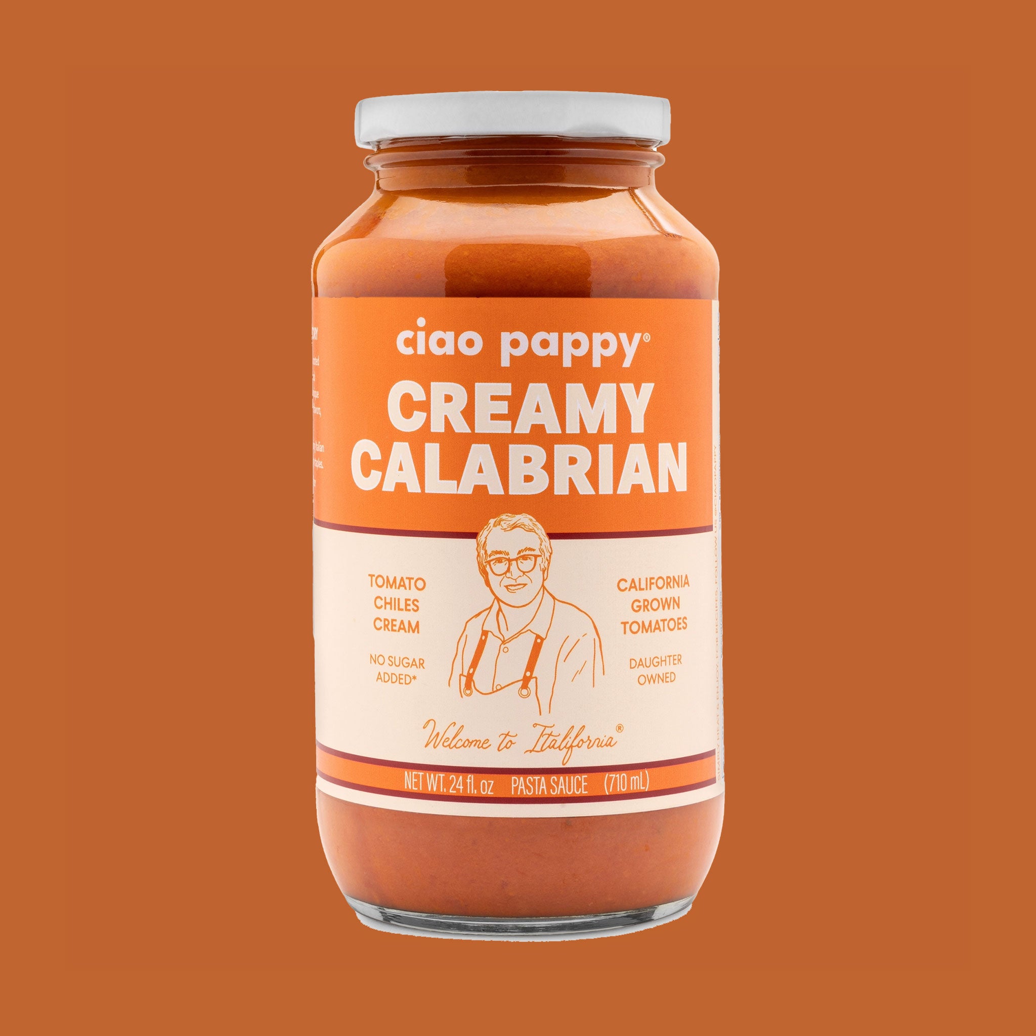 A glass jar of creamy calabrian marinara sauce. 