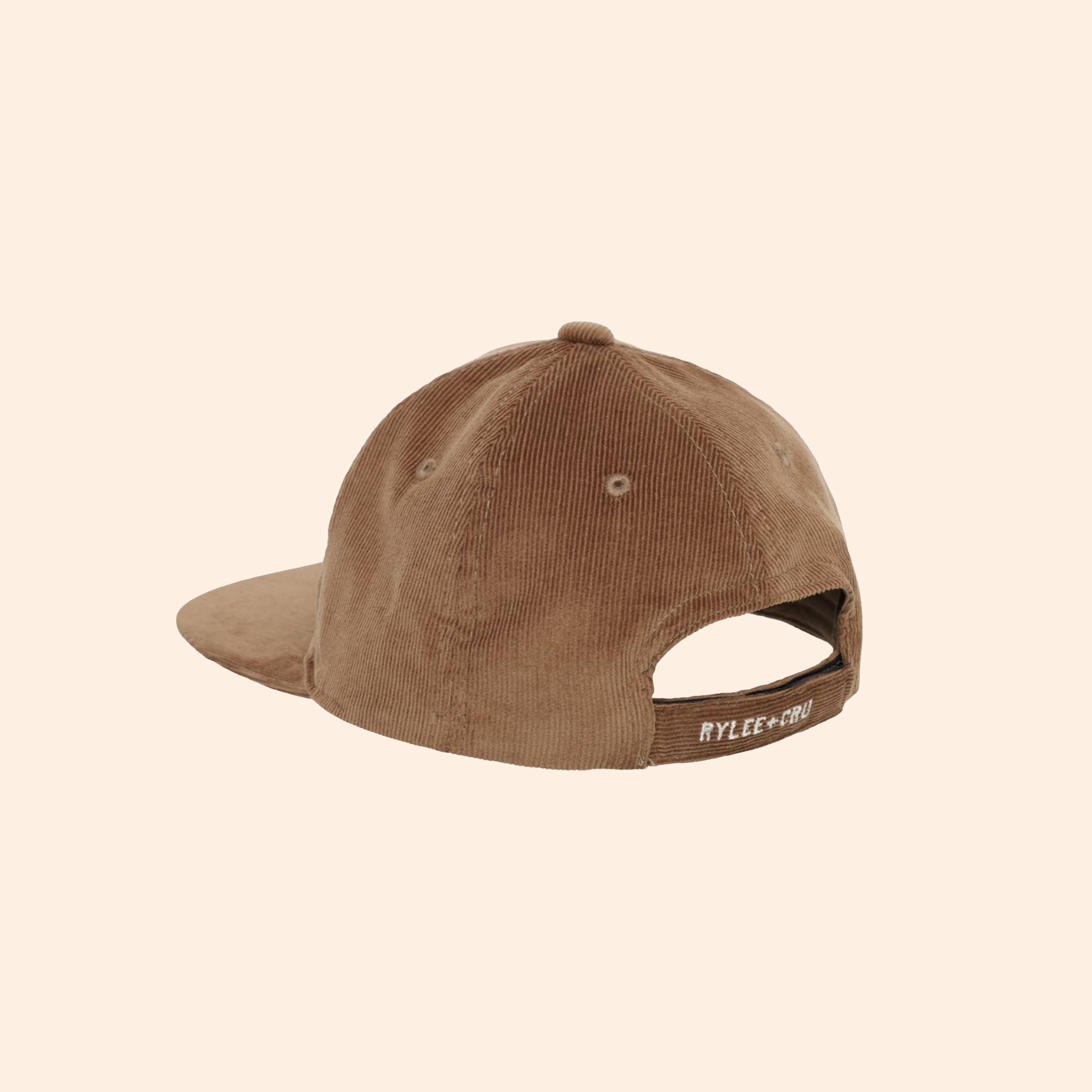 A corduroy brown baseball hat with white embroidered text that reads, &quot;howdy&quot; and &quot;Rylee and Cru&quot; on the snapback.