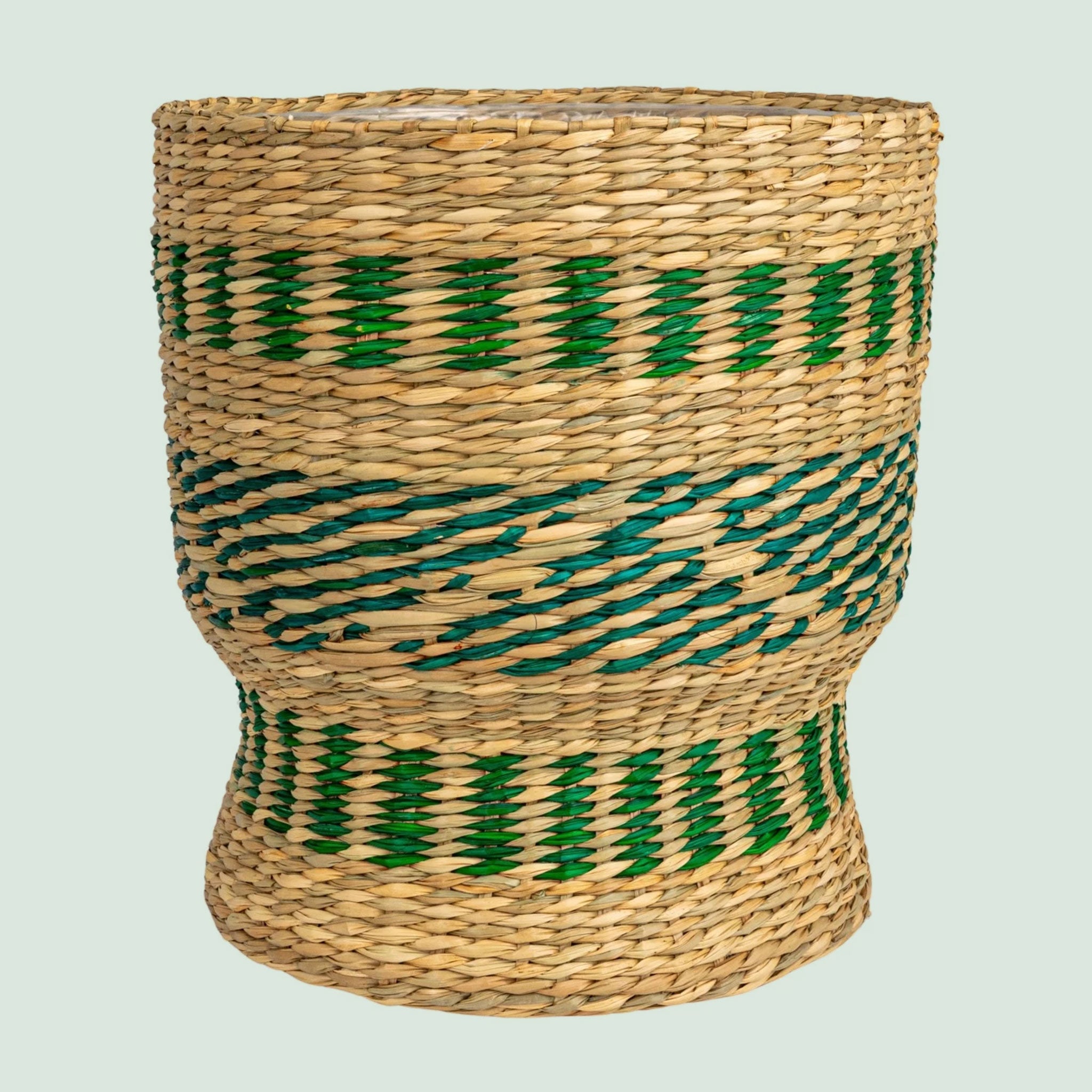 seagrass baskets with green stitching detail