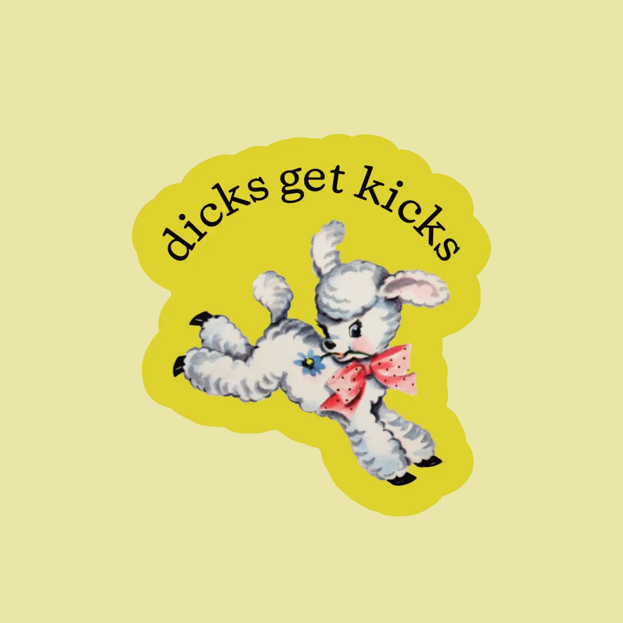 A green sticker with a graphic of a sheep and black text above that reads, 'dicks get kicks'.