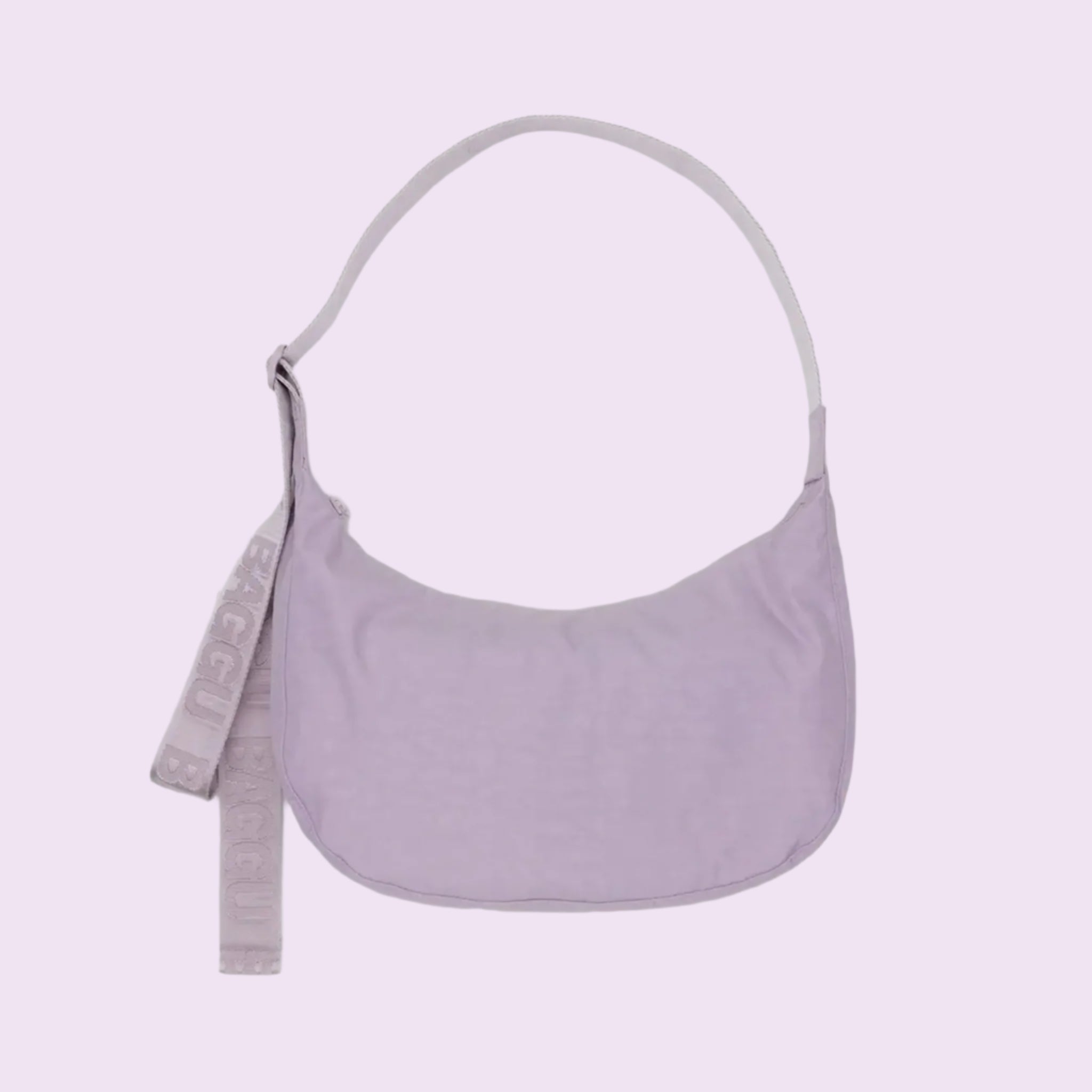 A cool toned, light pink nylon handbag with a curved shape and an adjustable strap. 