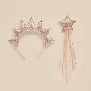 A rose gold crown headband with a star shaped sequin wand.